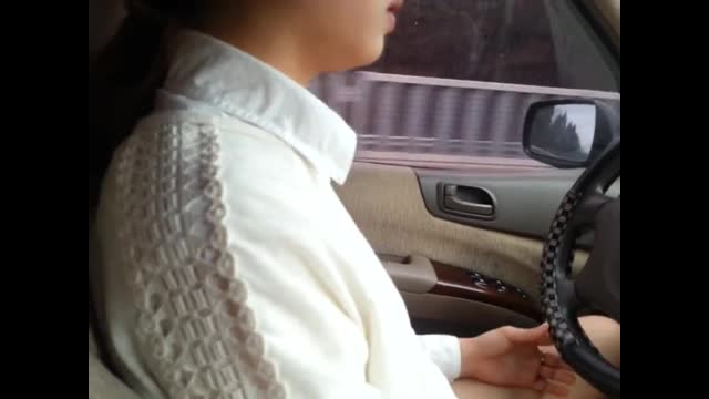 The cold wind blows into her hole! The female driver does not wear pants when driving. The air is cool and cool and blows to the The cold wind blows into her hole! The female driver does not wear pants when driving. The air is cool and cool and blows to the