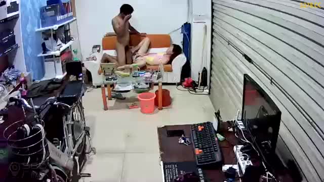 The hacker monitors the sneak shot of a couple who have dried the gun in the sales department after the shower. The hacker monitors the sneak shot of a couple who have dried the gun in the sales department after the shower.